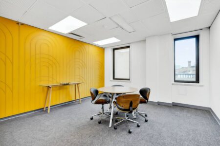4-seat-meeting-table-panelled-walls-Spot-Coworking